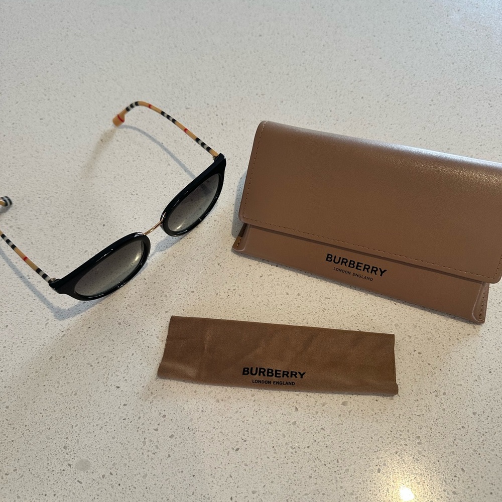 Black Burberry sunglasses with tartan legs